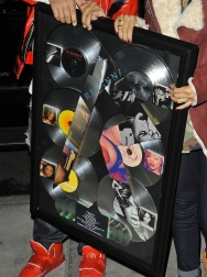 Rihanna2BRihanna2Bcarries2Bcommemorative2Bplaque2BGMKUWjbLQRrx.jpg