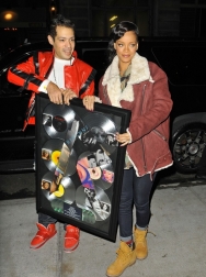 Rihanna2BRihanna2Bcarries2Bcommemorative2Bplaque2BWXXohD1LG6rx.jpg