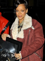 Rihanna2BRihanna2Bcarries2Bcommemorative2Bplaque2Bud4BIgRjf9dx.jpg